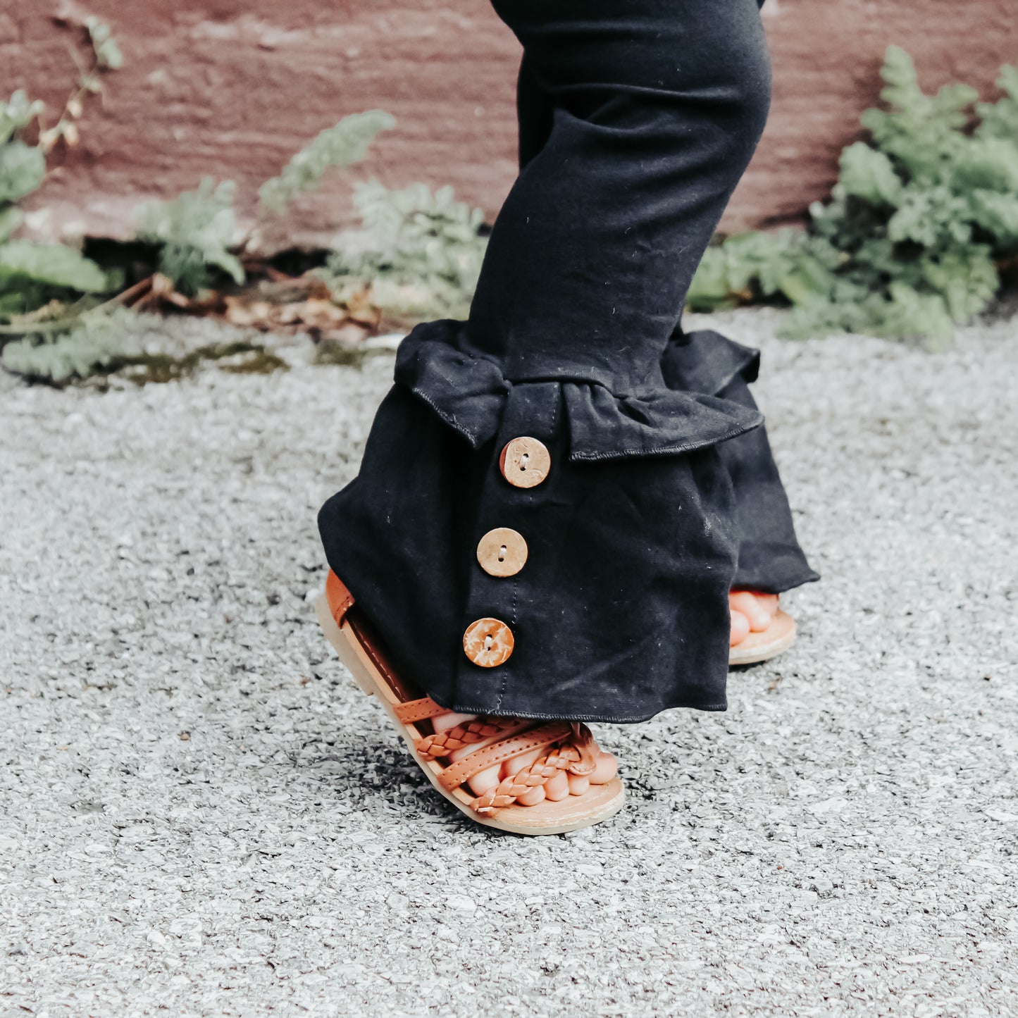 Black Solid Ruffle Pants with button accent