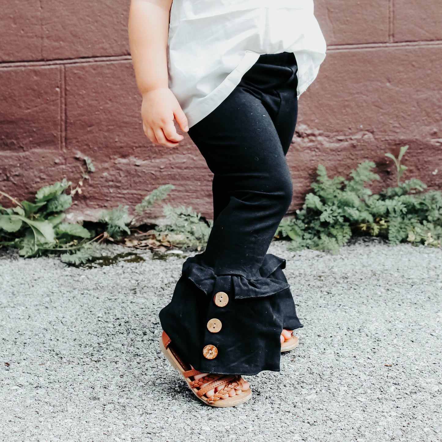 Black Solid Ruffle Pants with button accent