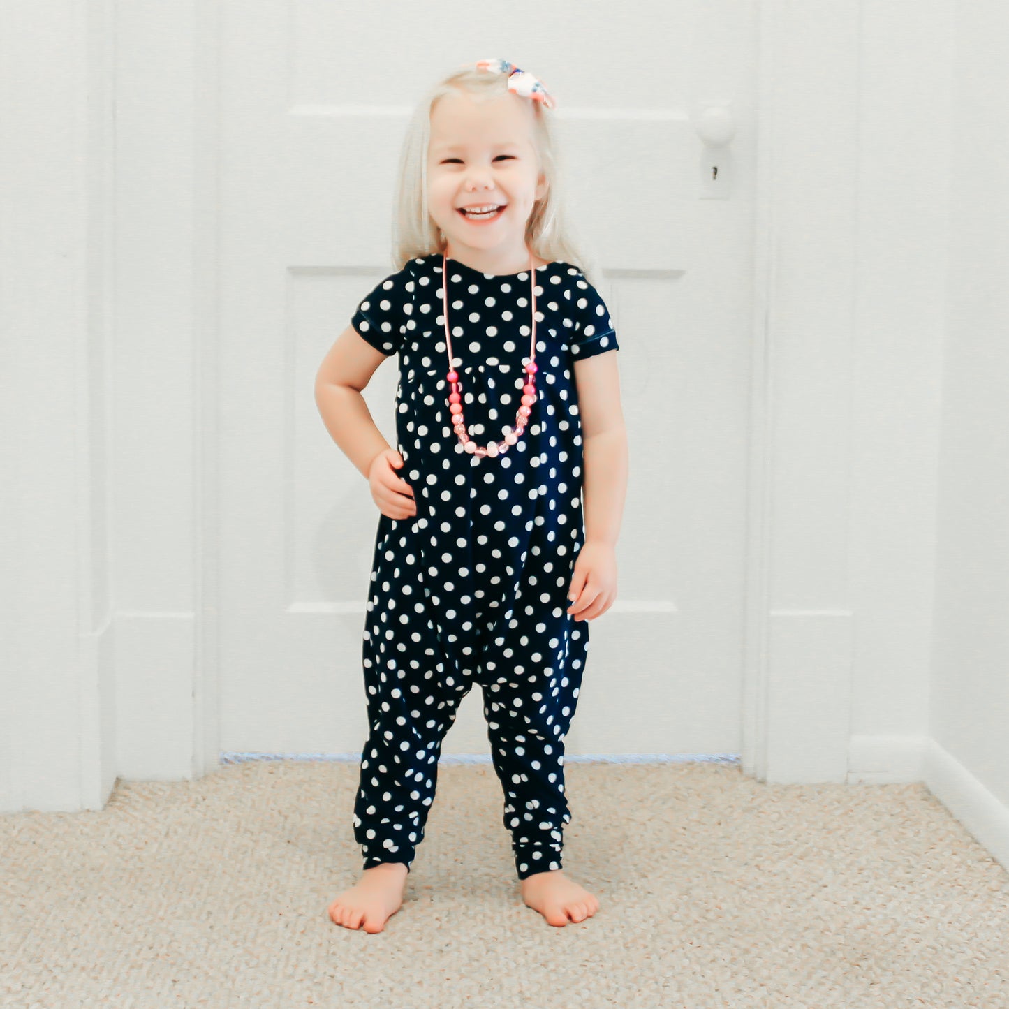 Navy Polka dot Alleycat Romper