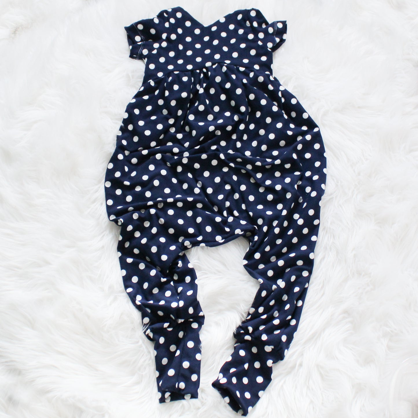 Navy Polka dot Alleycat Romper