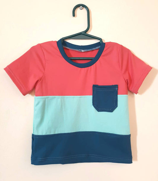 Unisex 2t color blocked tee with pocket.